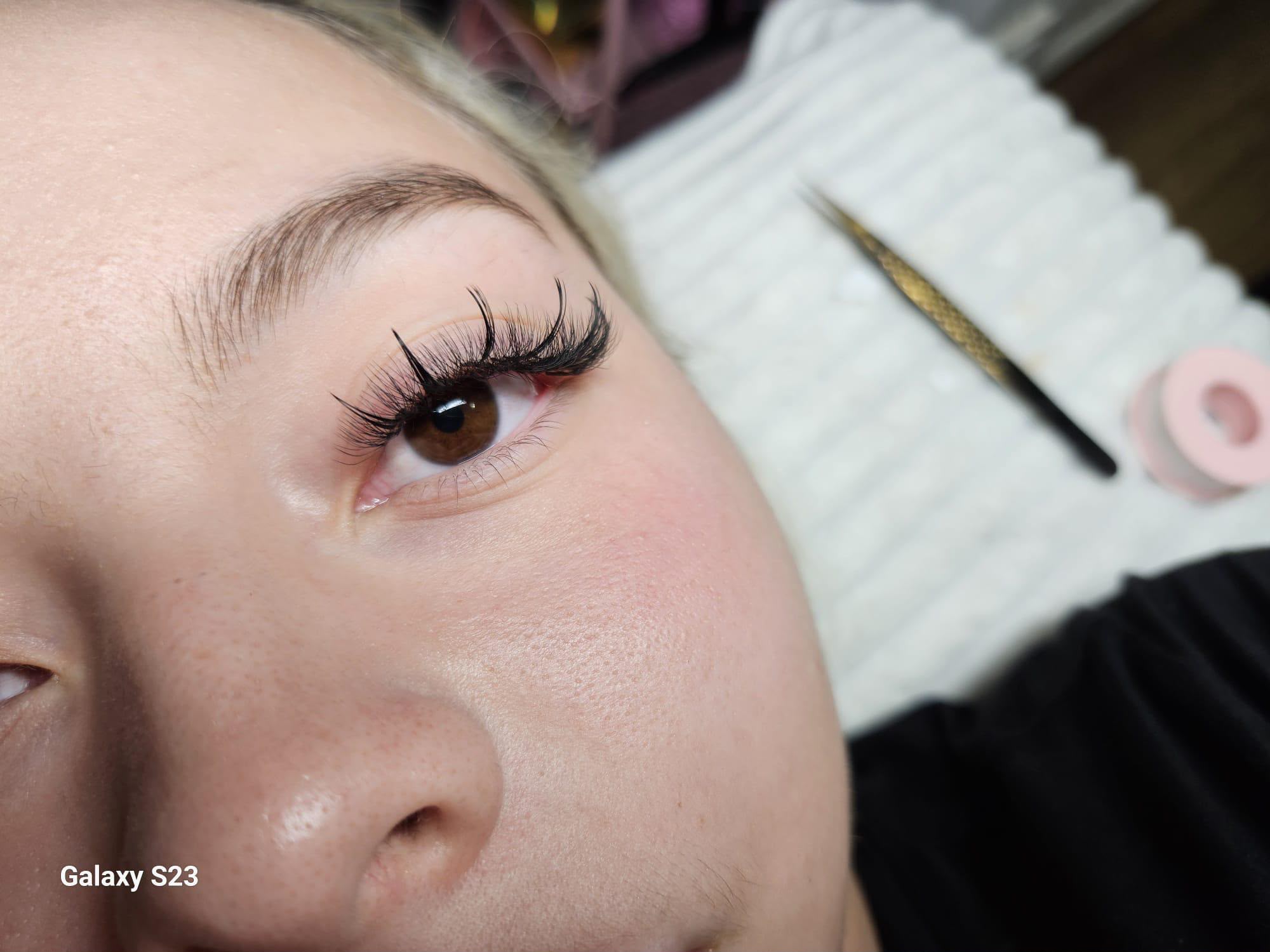 Side profile showing detailed lash artistry